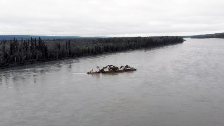 Barging equipment across the Liard River